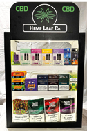 A display case with a variety of cigarettes and tobacco products.

Description generated by AI